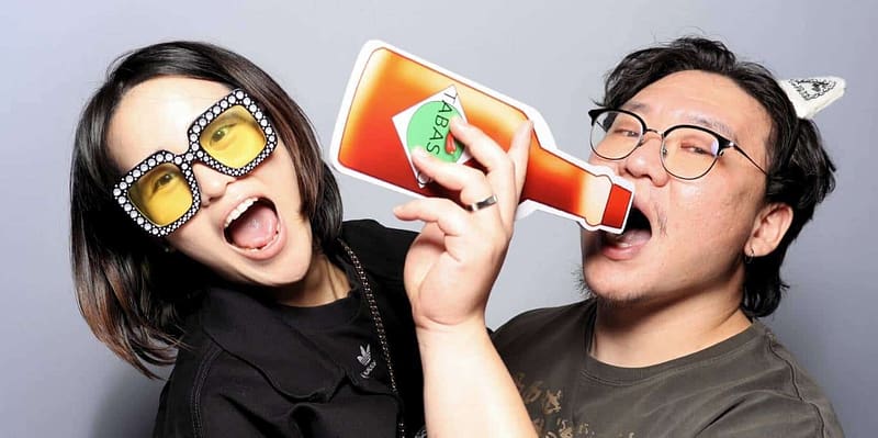 Colleagues posing with fun props at the Treyarch Black Ops 6 event with photo booth rental in Redondo Beach.